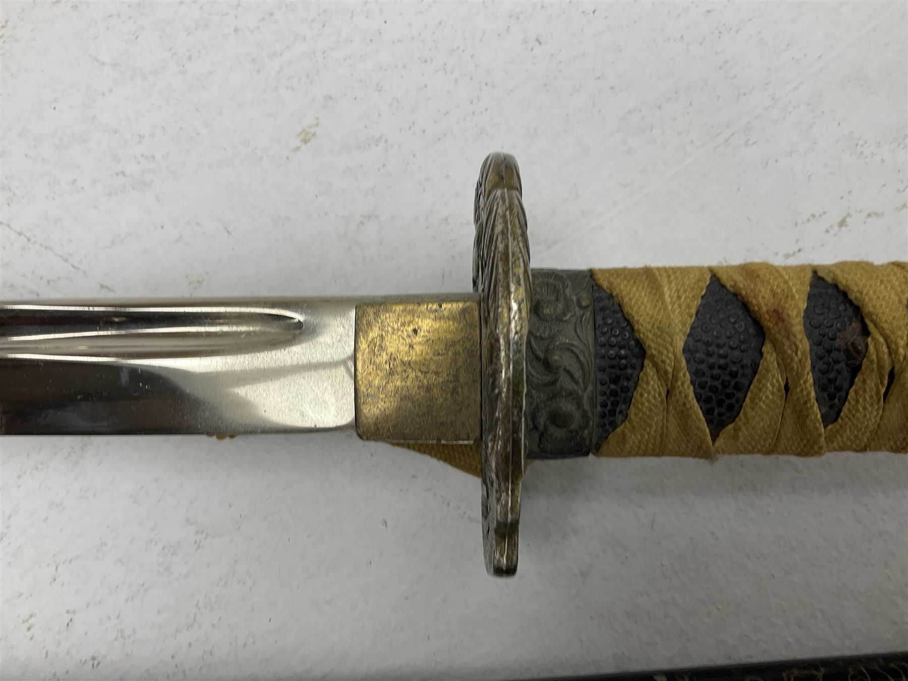 Reproduction Japanese katana with 63cm slightly curving fullered steel blade, ornate tsuba, cord bound grip and gilt transferred black saya L92cm; and two fencing foils, one marked Leon Paul (3)