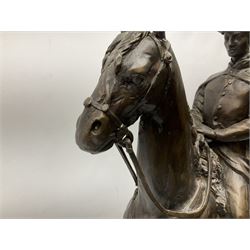 Large and impressive bronze figure of Wellington seated on a horse, on a sarcophogus shaped stepped base impressed 'Meunier Paris', the canted corners inset with battle trophies H68cm L50cm D22cm