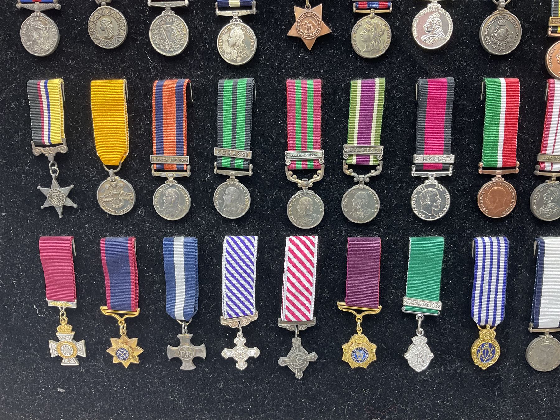 Two limited edition large framed display boards with half-size copies of British Gallantry and Campaign Medals produced by Danbury Mint and entitled 'For Valour'. Sixty medals on each board, all with ribbons. Complete with Danbury Mint certificate serial number A0148 and other paperwork.