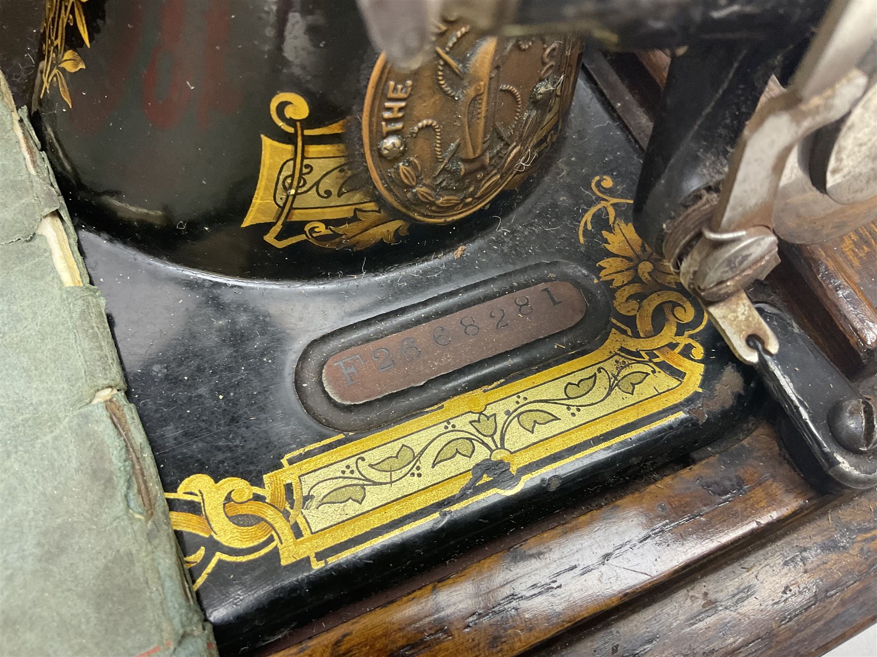 Singer 66 sewing machine in wooden case, together with an LG DVD player with speakers, two portable DVD players, etc 