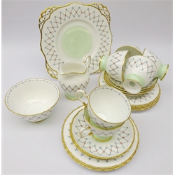  Mid 20th century Tuscan China tea set for six, decorated with a jeweled diamond shaped border on green ground    