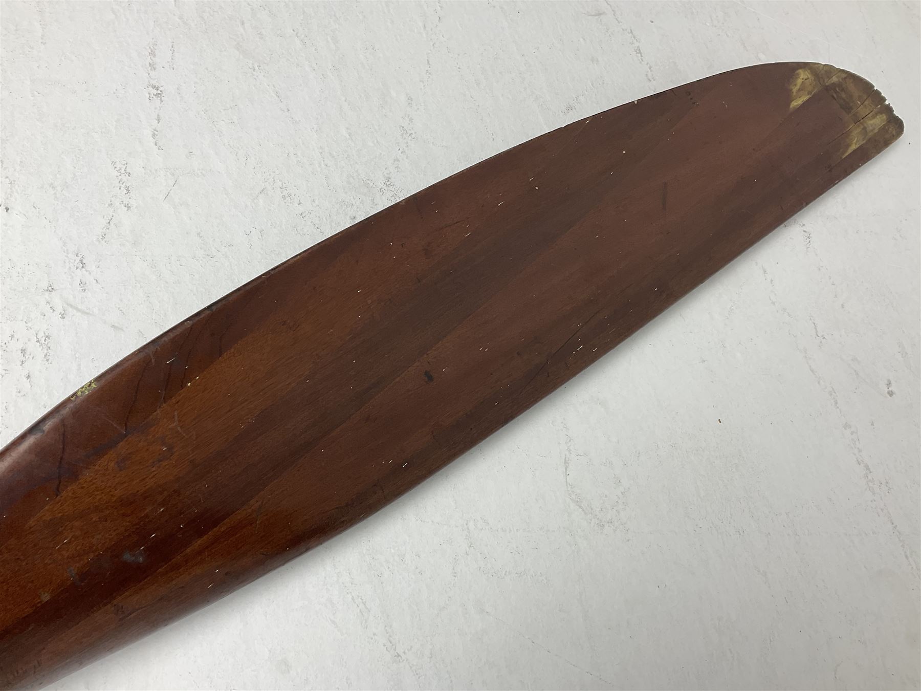Early 20th century Avro 504 80HP Gnome laminated mahogany two-blade propeller with metal centre to the hub, stamped to the face of the hub 'AVRO Y80 80HP GNOME TYPE 504 & 504A A.I.D.29 A.I.D.32 1545' and to the sides of the hub '2744 DIA 1829 PITCH' and '1470'; traces of A.V. Roe & Co Ltd Manchester transfers to both blades L273.8cm; Auctioneer's Note: The Avro 504 was introduced in 1913 and was quickly taken up by the Royal Flying Corps as a trainer and observation machine; robust and versatile it remained in general service as a trainer until the late 1920s then widely for civilian use as a joy-rider and for stunt displays. The legendary RAF WWII ace, Douglas Bader, took instructions and would have had his first solo flight in just such a machine.
