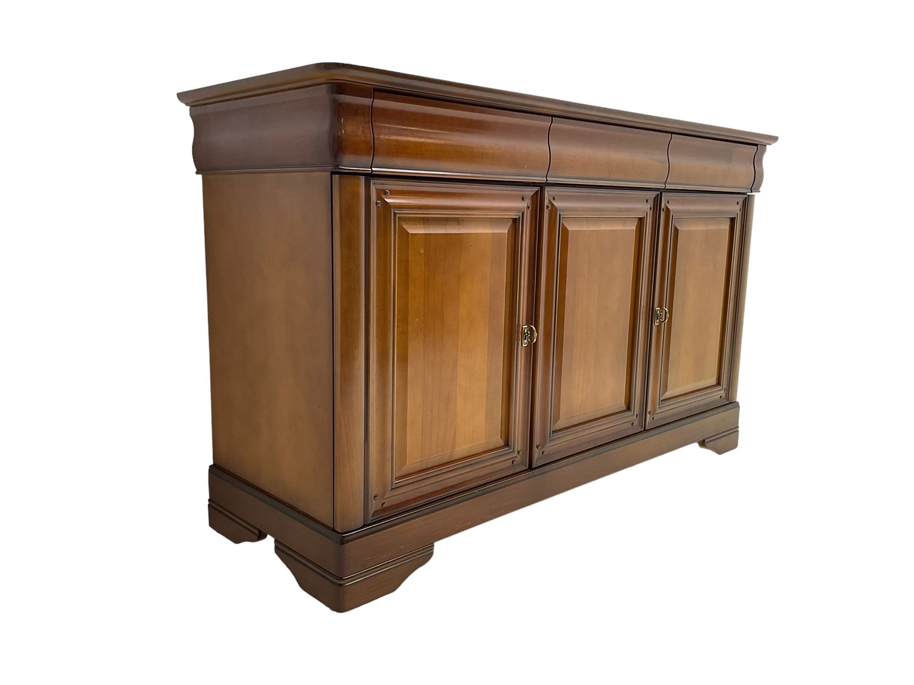 Cherry wood sideboard, fitted with three cushion drawers over three panelled cupboard doors, on bracket feet