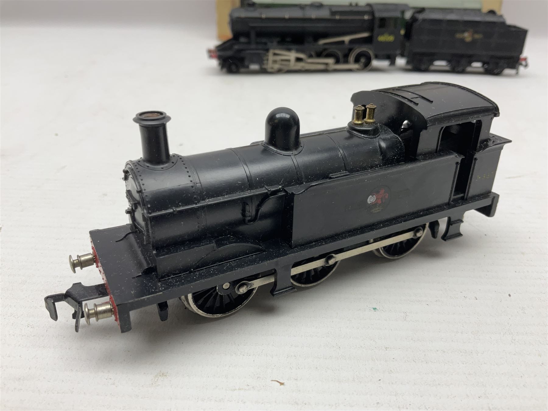 Hornby Dublo - 2-rail - Class 8F 2-8-0 locomotive No.48109 in BR black; Class R1 0-6-0 tank locomotive No.31337 in BR black; and Met-Vic Diesel Co-Bo locomotive No.D5702 in BR green; together with 3-rail Class 4MT Standard Tank 2-6-4 locomotive No.80054 in BR black; three unassociated boxes and one unboxed (4)