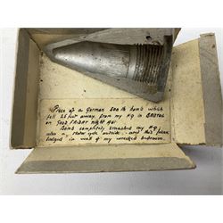 Small collection of WW2 shrapnel and German and British shell parts, most with manuscript details of where and when found including London, Leeds, Bristol, Linton-on-Ouse etc