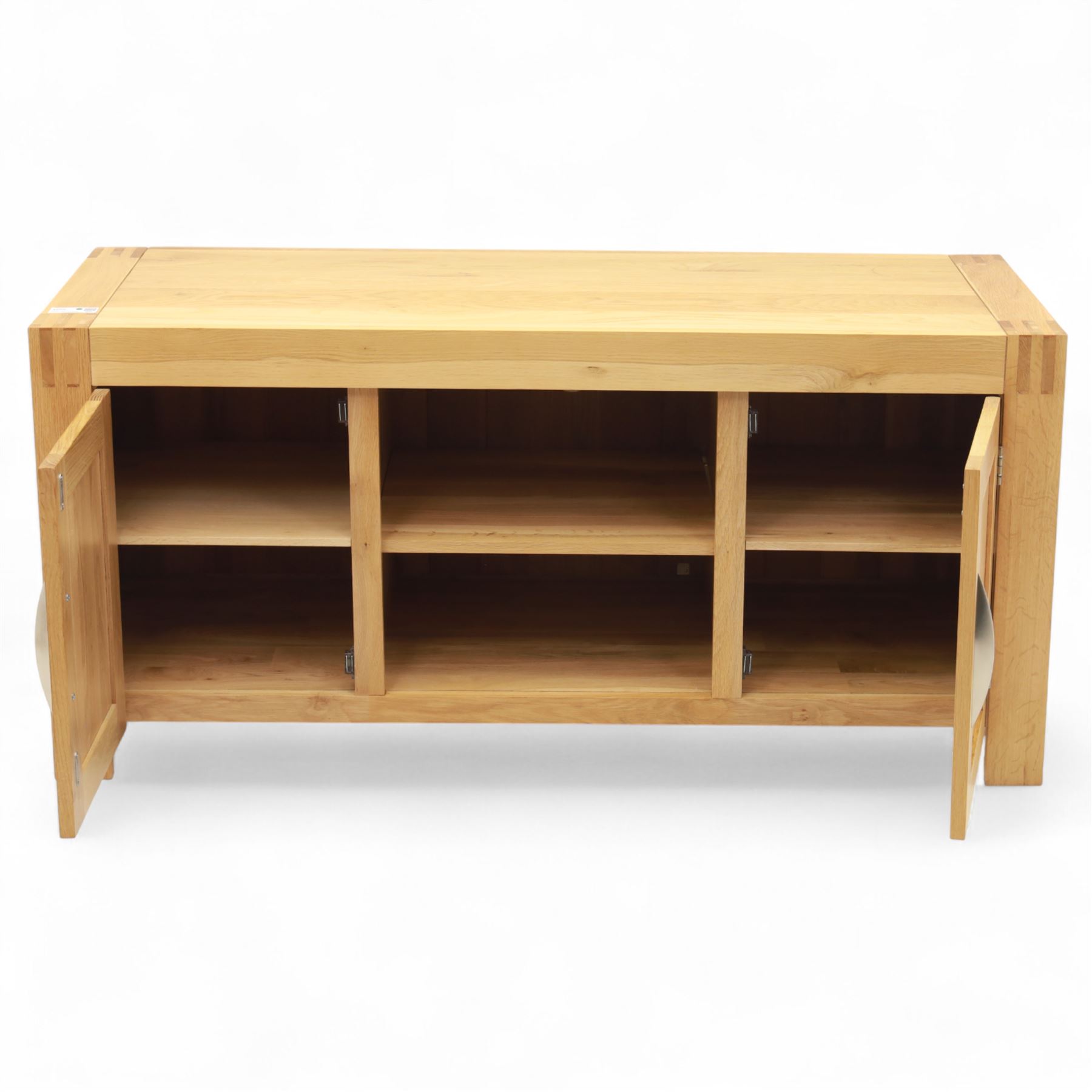 Contemporary solid oak television stand, rectangular top over an open central section with adjustable shelf, flanked by cupboard doors with vertical recessed panel fronts and brushed steel handles, on block feet