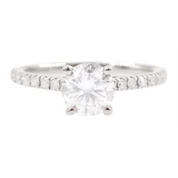 18ct white gold single stone round brilliant cut diamond ring, with diamond set shoulders,...