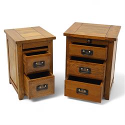 Two hardwood bedside chests,  of rectangular form, fitted with three drawers with recessed brass handles, panelled sides, and flush top, W55xD40xH68cm & W45D45xH68cm 