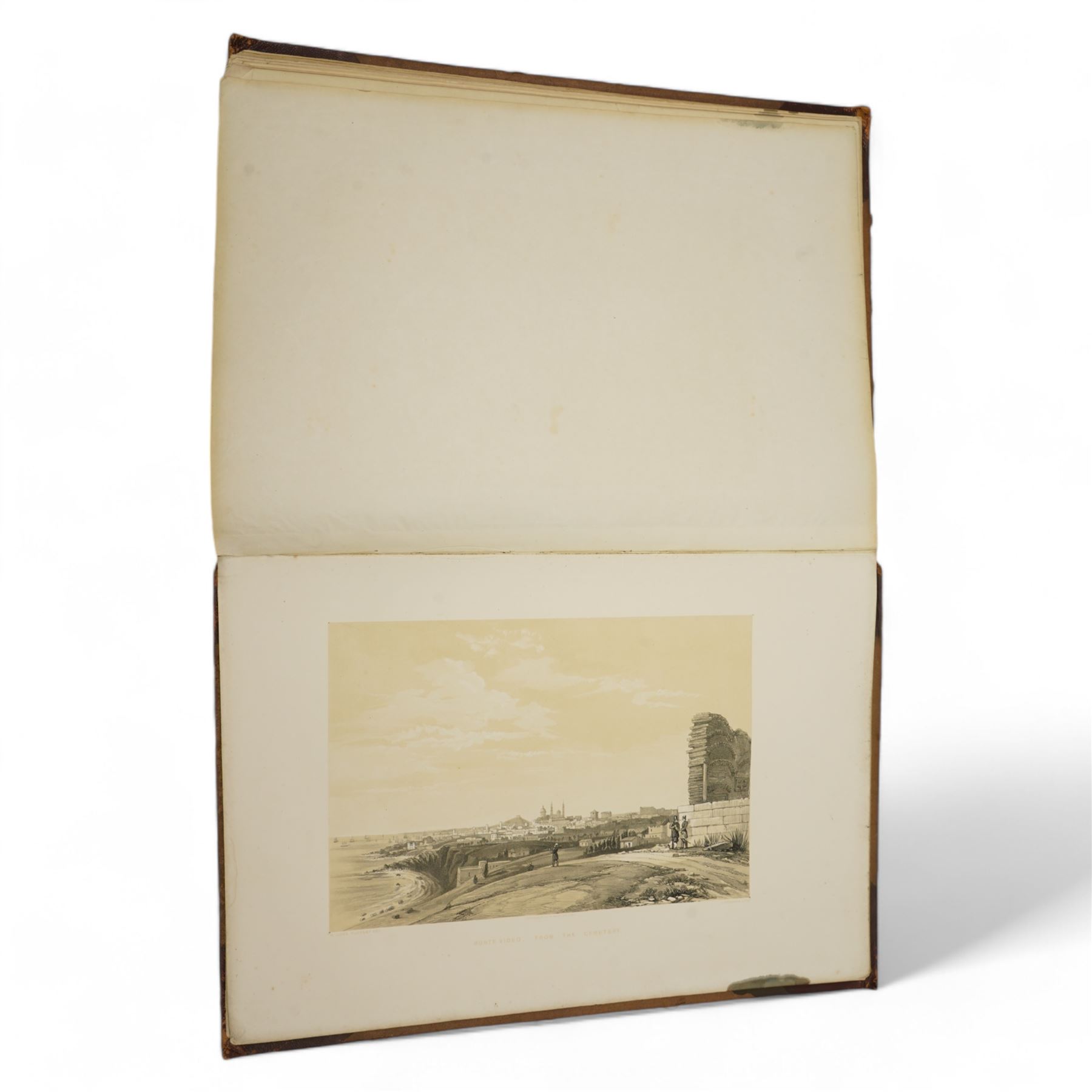 Sir William Gore Ouseley (British 1797-1866): 'Views in South America, from original drawings made in Brazil the River Plate, the Parana, &c', folio containing twenty six (26) tinted lithograph plates with lithographed titled and plan, dedication to Prince Albert with list of plates on verso, pub. London: Thomas McLean 1852, bound in oxblood leather and brown cloth
