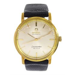 Omega Seamaster De Ville gentleman's 18ct gold automatic wristwatch, silvered dial with baton hour markers, on black leather strap
