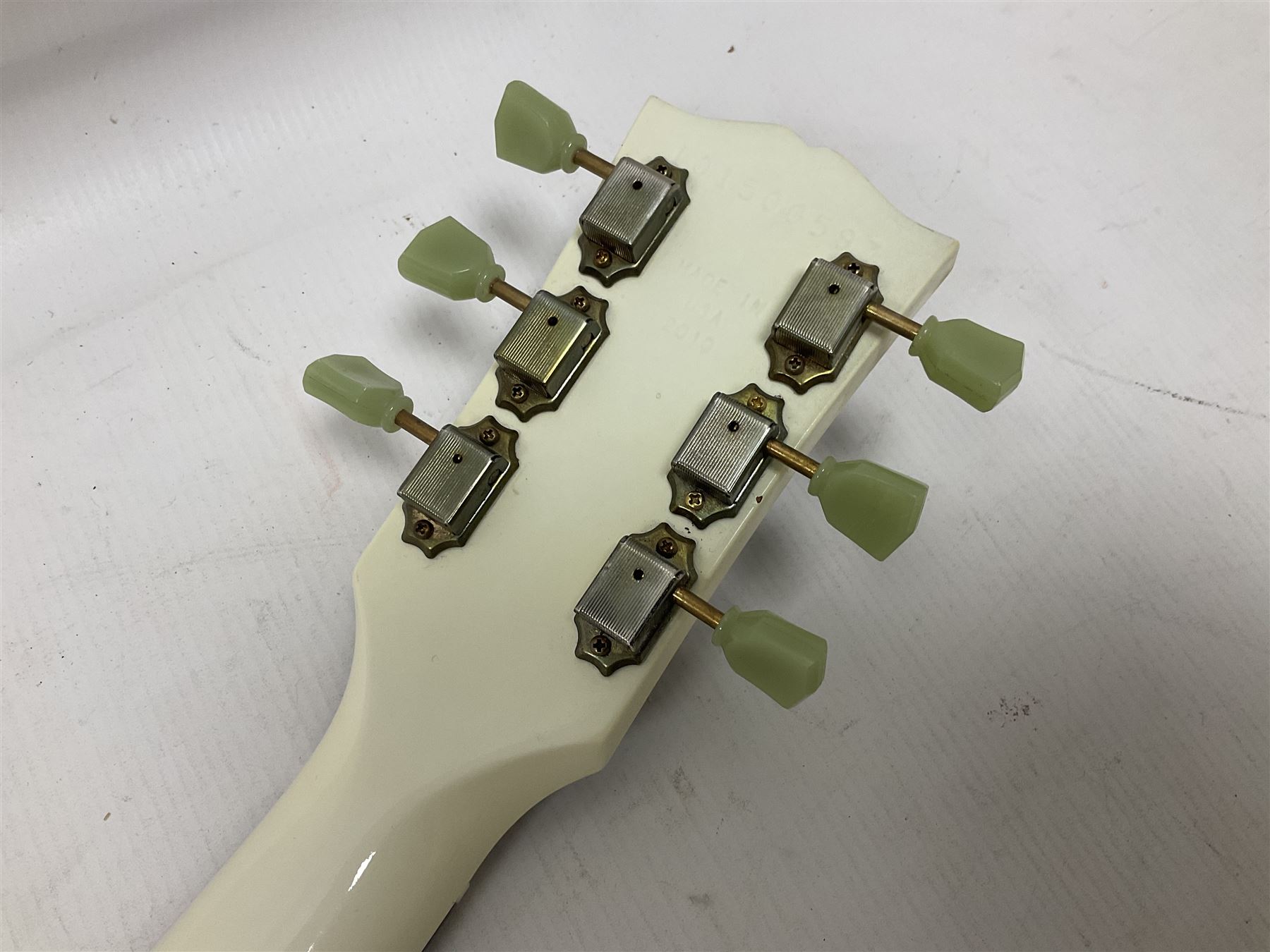 2010 Gibson Les Paul studio guitar, serial no101500537 in white finish with gold and pale green hardware, in Auden soft carry case, guitar L100cm