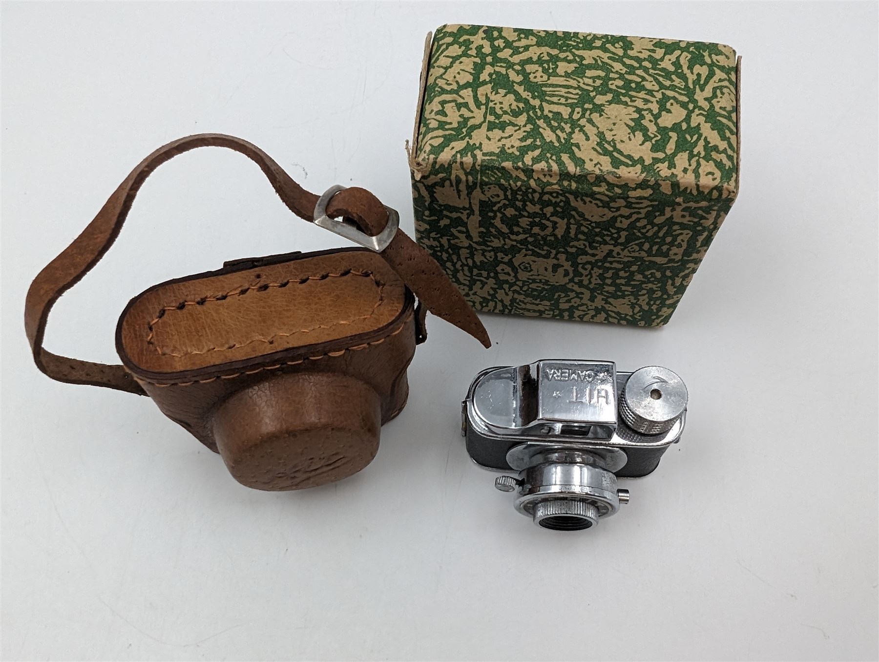 HIT spy camera, in original case, with box