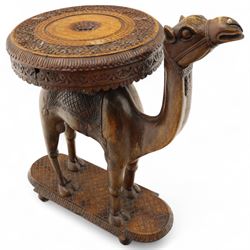 Late 19th century Anglo-Indian teak occasional table, the circular top profusely carved wi...