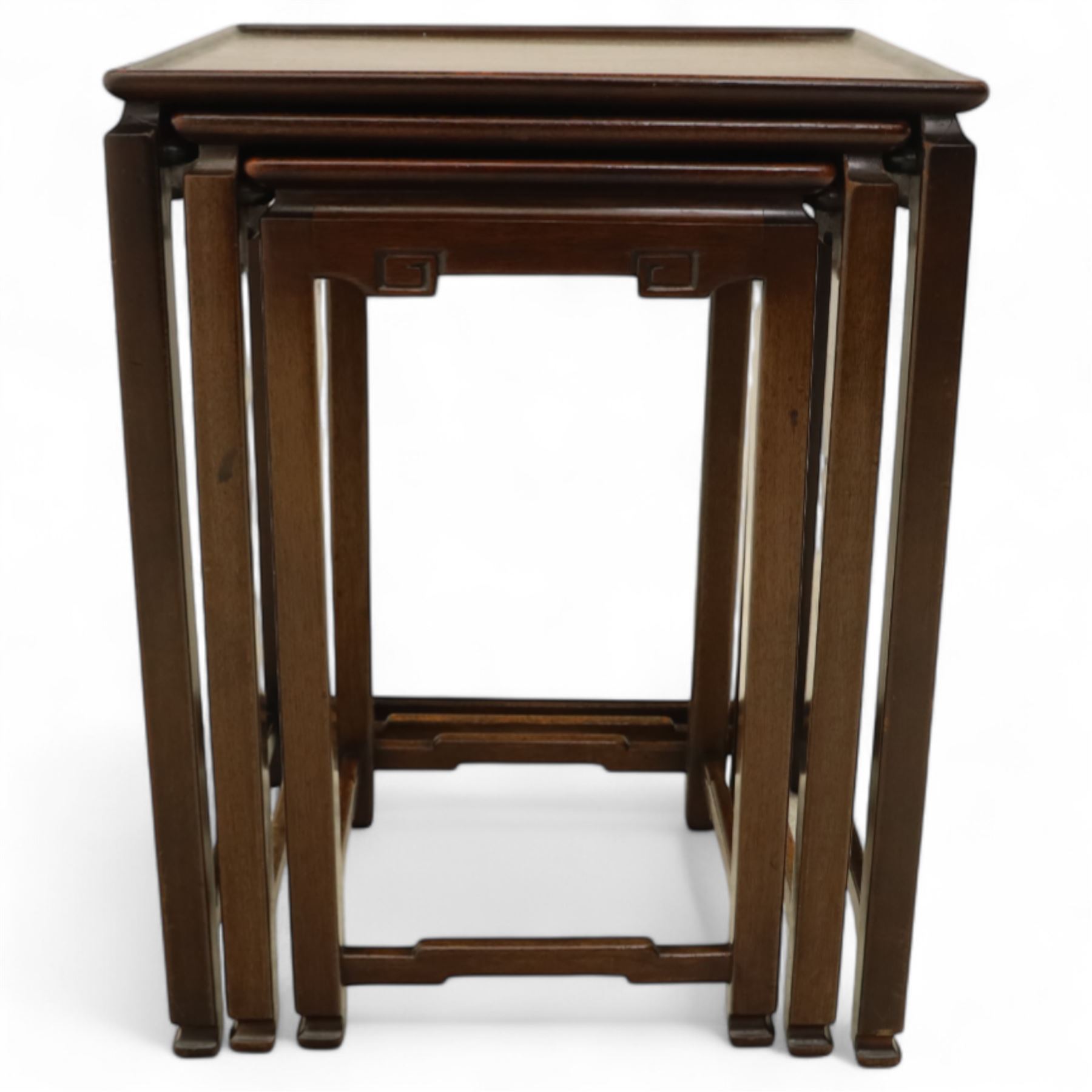 Whytock & Reid, Edinburgh  - Edwardian nest of three Chinese-style solid mahogany occasional tables, rectangular top with finely moulded edge above slim square section legs with subtly chamfered inner edges, joined by H-shaped stretchers, largest W40xD33xH52cm