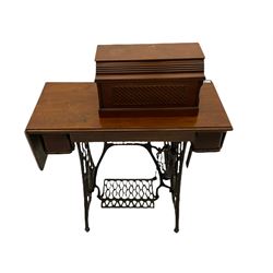 Singer - walnut and cast iron treadle sewing machine