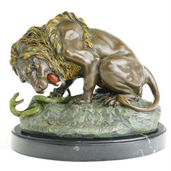 After Alfred Barye (French 1839-1882): Lion and Serpent, painted bronze figure, H24cm 