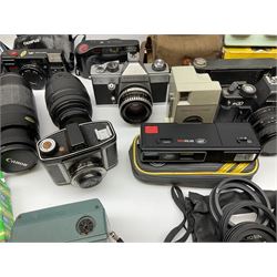 Vintage and later cameras, lenses, accessories and darkroom equipment including Zenit 12XP camera, Praktica BX20 camera fitted with 'Sigma Zoom Master 1:3.5-4.5 f=35-70mm' lens, Praktica LLC camera fitted with 'Carl Zeiss Jena Pancolar 1.8/50' lens, Canon Zoom Lens 'EF 100-300mm 1:5.6', various Jessop and other makers darkroom items including safelight (Red), universal duo tank, multi-mask enlarging easel etc, in three boxes