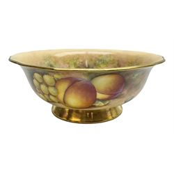 Mid 20th century Royal Worcester bowl decorated by Alan Telford, of circular form with shaped rim, upon a short gilt foot, the interior and exterior hand painted with a still life of fruit upon a mossy ground, signed Telford, with black printed mark beneath, H8cm D20cm
