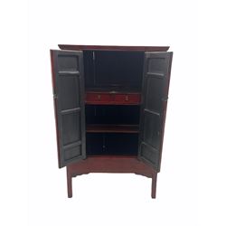  Chinese red lacquered elm and pine Moon marrige cabinet, enclosed by two doors, brass metalwork and hinges