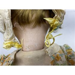 Carl Harmus Germany bisque head doll with applied hair, sleeping eyes, open mouth with teeth and composition body with jointed limbs; marked 'Harmus 313.4/0 Germany' H38cm; and Alt, Beck & Gottschalk Germany bisque head doll with applied hair, fixed eyes, open mouth with tongue and composition body with jointed limbs H44cm (2)