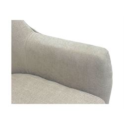 Contemporary tub armchair upholstered in beige fabric