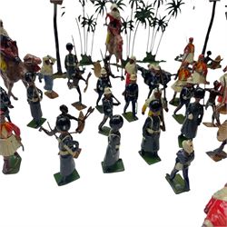 Britains lead figures circa 1930, comprising eight 'Grenadier Guards', seven 'Royal Marines', eight pre-war 'Greek Evzones', eight 'Zulu Warriors', six marching 'Bedouin Arabs' and two on horseback, five 'Arabs of the Desert' including two on horseback and three mounted on camels and five palm trees