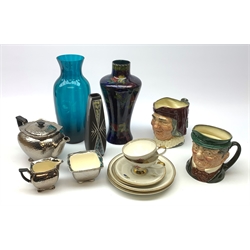Various ceramics, comprising a Rubensware Pomegranate pattern vase, H29cm, two Royal Doulton character jugs, Royal Winton Grimwades teapot, milk jug, and open sucrier, etc., plus a blue glass vase. 