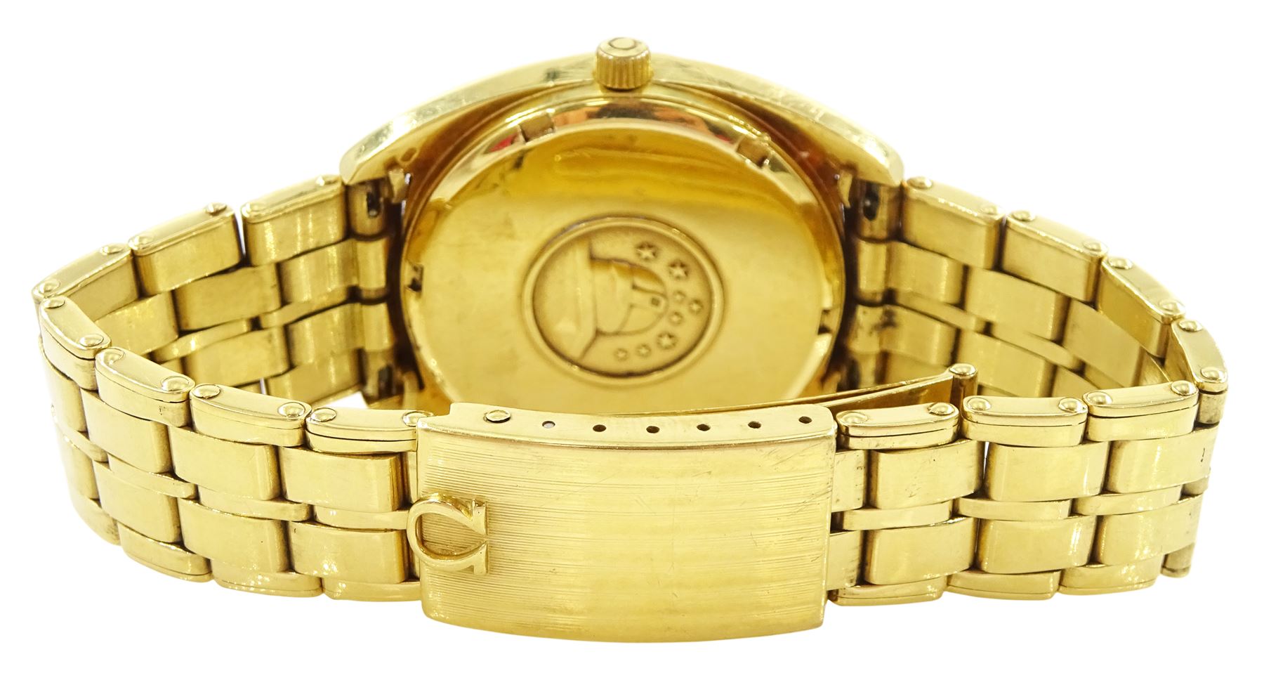 Omega Constellation gentleman's 18ct gold chronometer automatic wristwatch, Ref. 168.0057, Cal 1021, champagne dial with day / date aperture and baton hour markers, stamped 750 with Helvetia hallmark, on original 18ct gold expanding bracelet, with fold-over clasp, London import mark 1973
