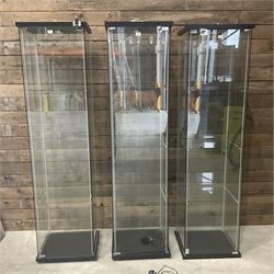 Three Ikea rosewood finish illuminated four glass shop display cabinets, with shelves and keys