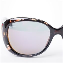 Gucci - pair of oversized sunglasses, with graduated mirrored lenses in tortoiseshell-effect frame, the arms with signature web stripe and interlocking gold-tone GG logo, unused with original monogram leather case 