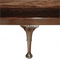 Early 20th century mahogany window seat in the George II style, with rectangular padded seat upholstered in brown velvet, raised on cabriole legs with carved shell knees and pad feet