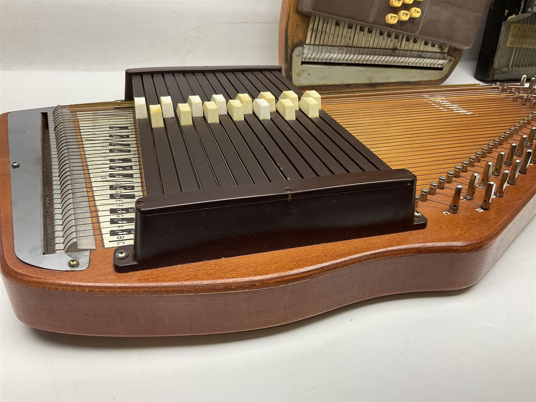 Oscar Schmidt Autoharp L60cm; cased; another uncased; and a Zimmerman Autoharp (3)