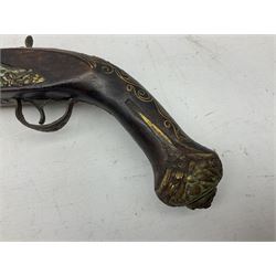 Reproduction flintlock pistol, the full walnut stock with brass filigree inlay and mounts and skull crusher butt L46cm; no visible proof marks FIREARMS CERTIFICATE REQUIRED OR RFD