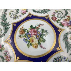 19th Sèvres style porcelain cup and saucer, the cup painted with a figural scene, against a scalloped border of scrolling floral swags on a blue ground, together with a Sèvres soft paste porcelain coffee can and saucer, painted with panels of exotic birds, roses and a border of cornflowers, LL monogram enclosing date letters H above painters mark, coffee can H6.5cm, saucer D13.5cm (2)