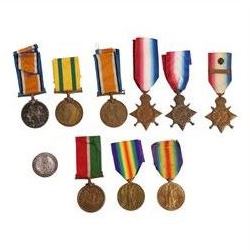 WWI British group of nine medals and silver war badge, including bronze War medal, 1914 St...