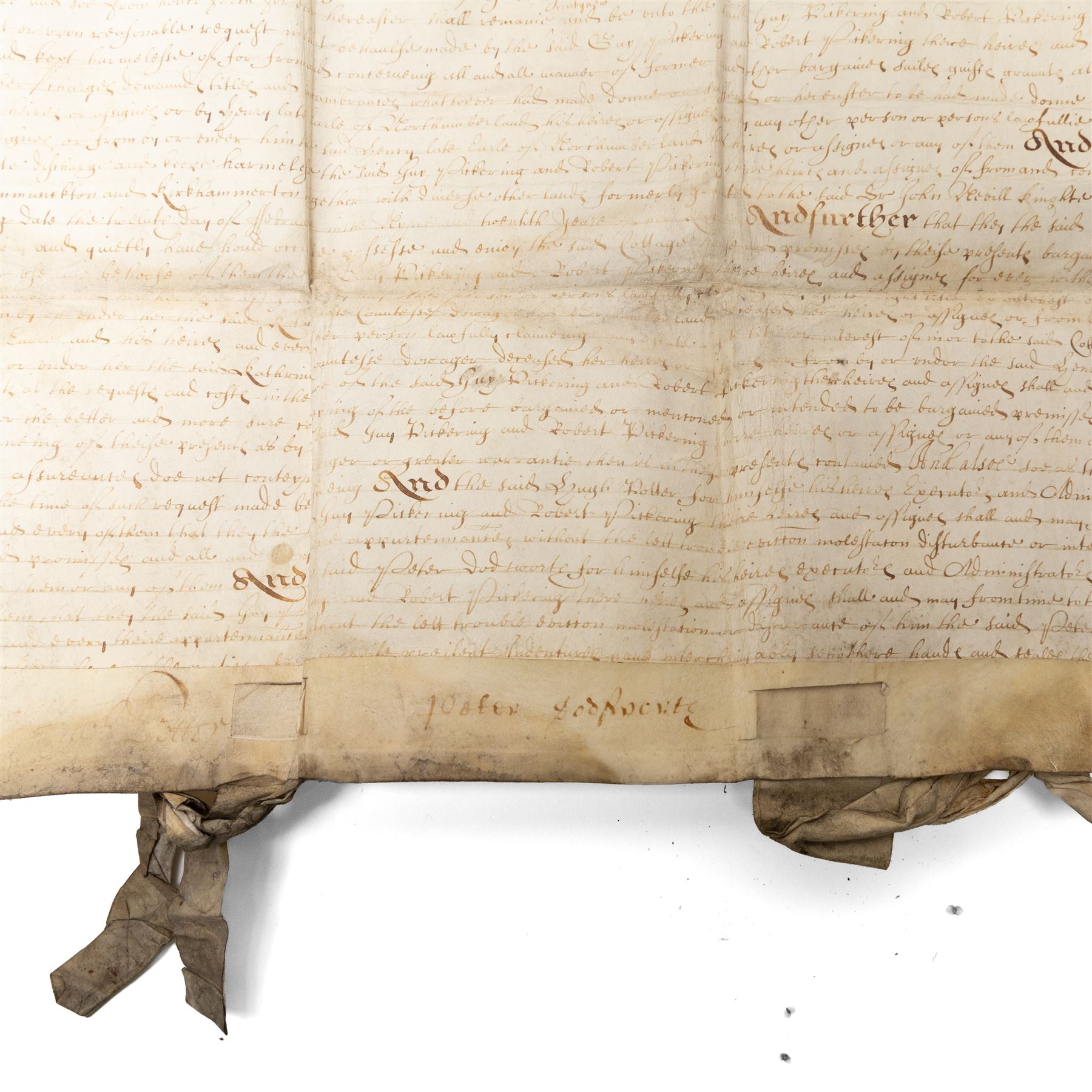 Algernon Percy, 10th Earl of Northumberland: English Civil War period vellum indenture, dated 16 August 1647, between Algernon Percy, Earl of Northumberland and Elizabeth, Countess of Northumberland, relating to a cottage, garth and lands at Hunmanby, Yorkshire, granted to Guy Pickering and Robert Pickering, with reference to Hugh Potter and Peter Dodsworth, manuscript on vellum with decorative initial, pendant seal tag and signatures/witnesses verso

Notes:
Algernon Percy, 10th Earl of Northumberland (1602-1668), was Lord High Admiral to Charles I and later a leading moderate Parliamentarian during the English Civil War. Dated August 1647, this indenture was executed in the aftermath of the First Civil War, while Percy was closely involved in Parliamentary government and in the custody of the King’s younger children. The document concerns property at Hunmanby, Yorkshire, and includes reference to tenure connected with the Crown and King Henry VIII