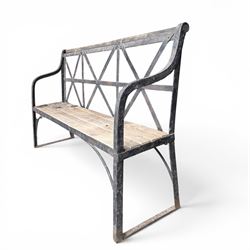 19th century and later Estate made wrought iron strapwork garden bench, the weathered wooden cresting rail over X-form strapwork back and slatted wooden seat