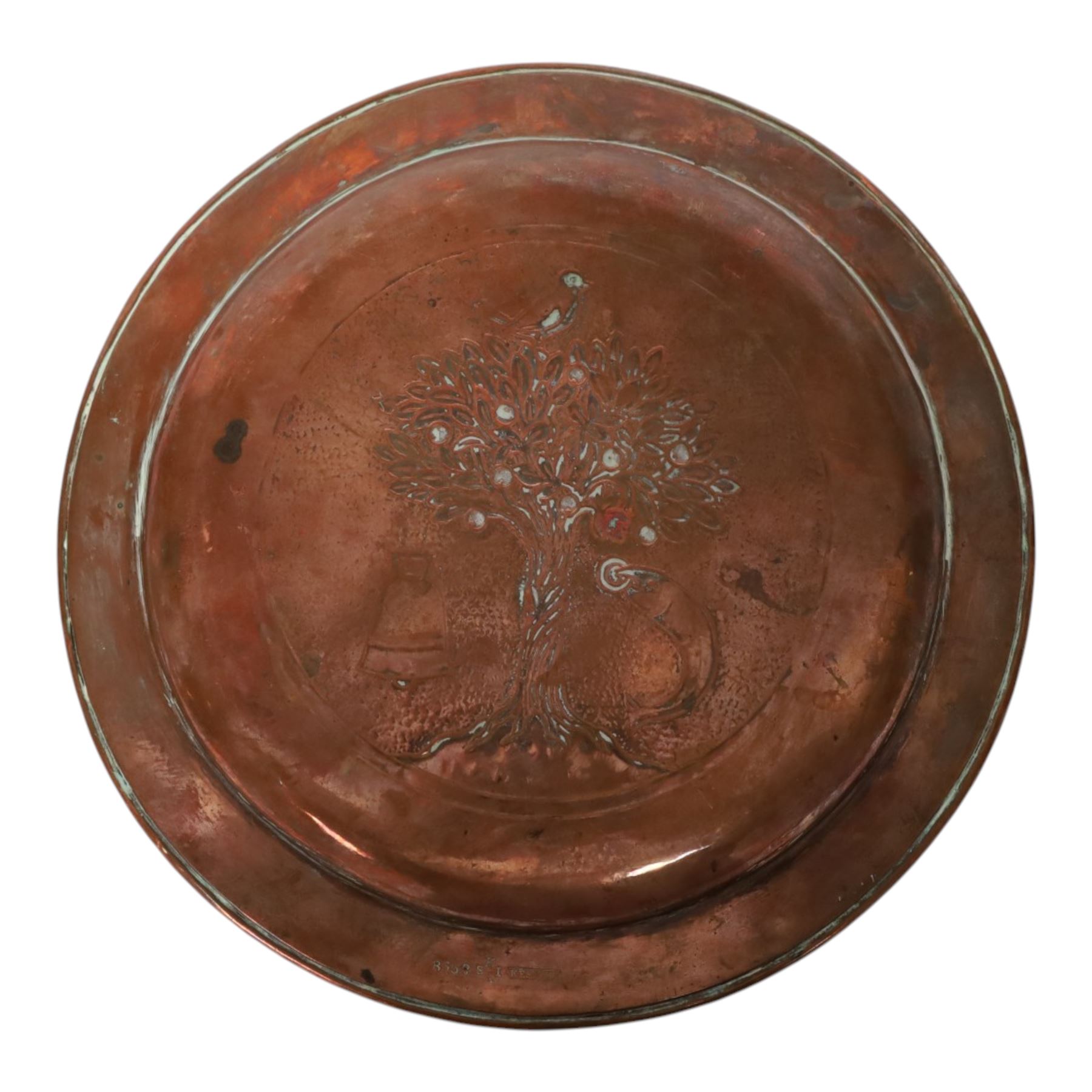 The Keswick School of Industrial Art, St Kentigern charger, the central panel which features four key symbols representing miracles from his life ', which features four key symbols representing miracles from his life: bird, tree, bell, and fish with a ring, 'The bird that never flew, the tree that never grew, the bell that never rang, the fish that never swam', marked beneath B352 KSIA Keswick, D24cm