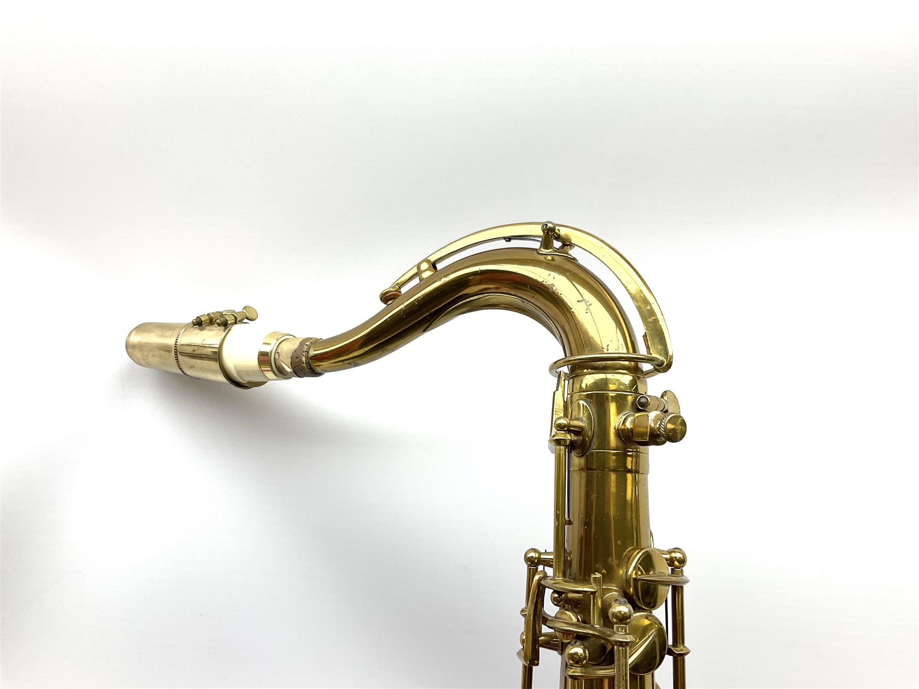 Brass tenor saxophone by Adolphe SAX, 84 Rue Myrha, Paris,  No.938 serial number 12097, H75cm excluding crook; in hard carrying case bearing plaque for Henri Selmer