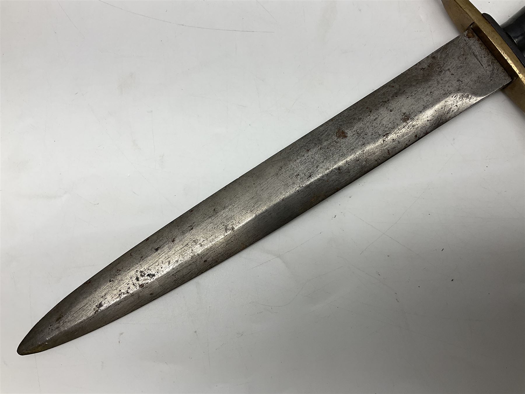 Italian Model 1891 bayonet with 30cm fullered blade; the crosspiece marked 'TERNI'; in associated brass and leather scabbard L43cm overall; and Knights Templar (?) short blade sword (no scabbard) (2)