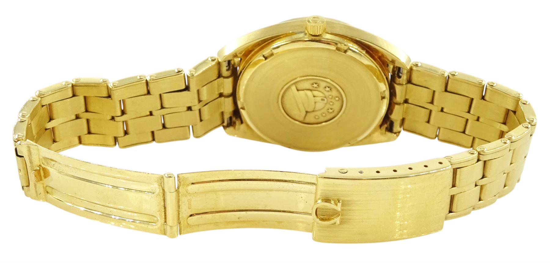 Omega Constellation gentleman's 18ct gold chronometer automatic wristwatch, Ref. 168.0057, Cal 1021, champagne dial with day / date aperture and baton hour markers, stamped 750 with Helvetia hallmark, on original 18ct gold expanding bracelet, with fold-over clasp, London import mark 1973