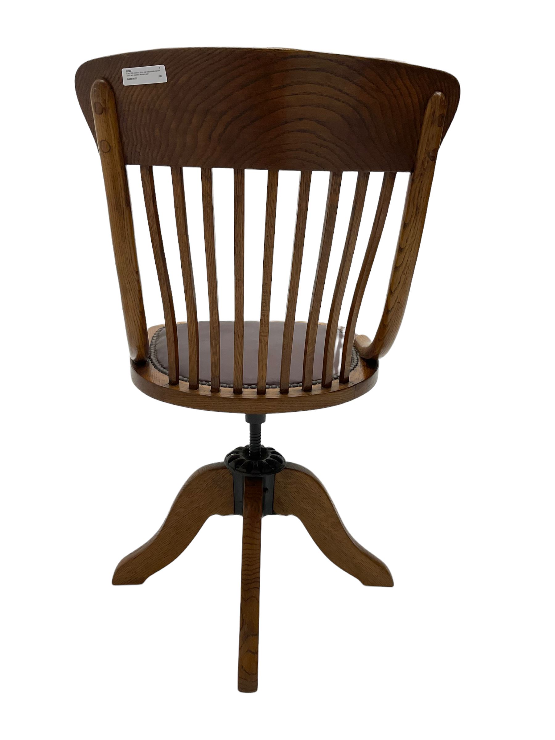 Early 20th century office oak adjustable swivel chair with studded leather seat