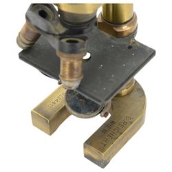 Early 20th century Austrian brass monocular microscope by C Reichert, together with a brass cased pocket barometer by Griffin & George, a WWII TG Co Ltd Mark 1 Magnetic Marching Compass and a drawing set