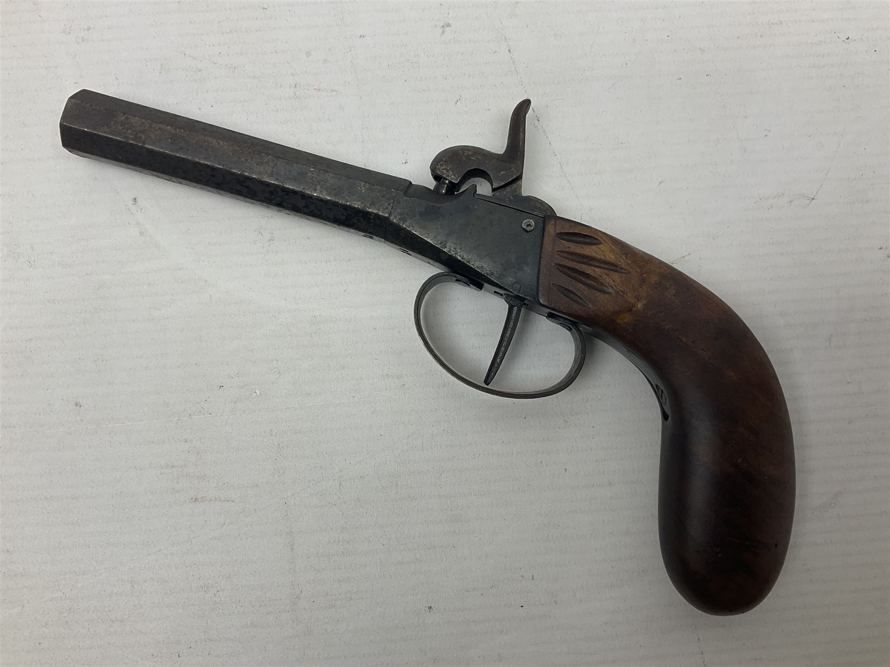 Percussion pocket pistol, 9cm octagonal barrel with German proof marks, figured walnut stock 21cm overall