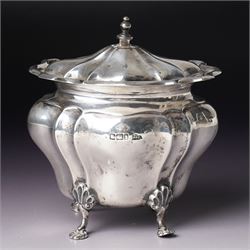 Edwardian silver tea caddy of fluted oval form with shaped supports Sheffield 1903 Maker W...
