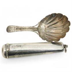 Early 19th century silver mounted cowrie shell snuff box with engraved decoration, George IV silver caddy spoon and a silver cheroot holder