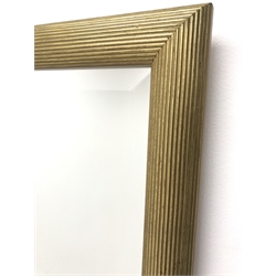 Rectangular bevel edge wall mirror in reeded gilt frame, W60cm, H85cm