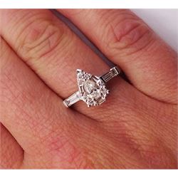 White gold pear shaped diamond cluster ring, with baguette diamond shoulders, hallmarked 9ct, total diamond weight 0.90 carat