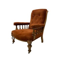 Late 19th century oak drawing room armchair, upholstered in buttoned fabric, turned and fluted supports