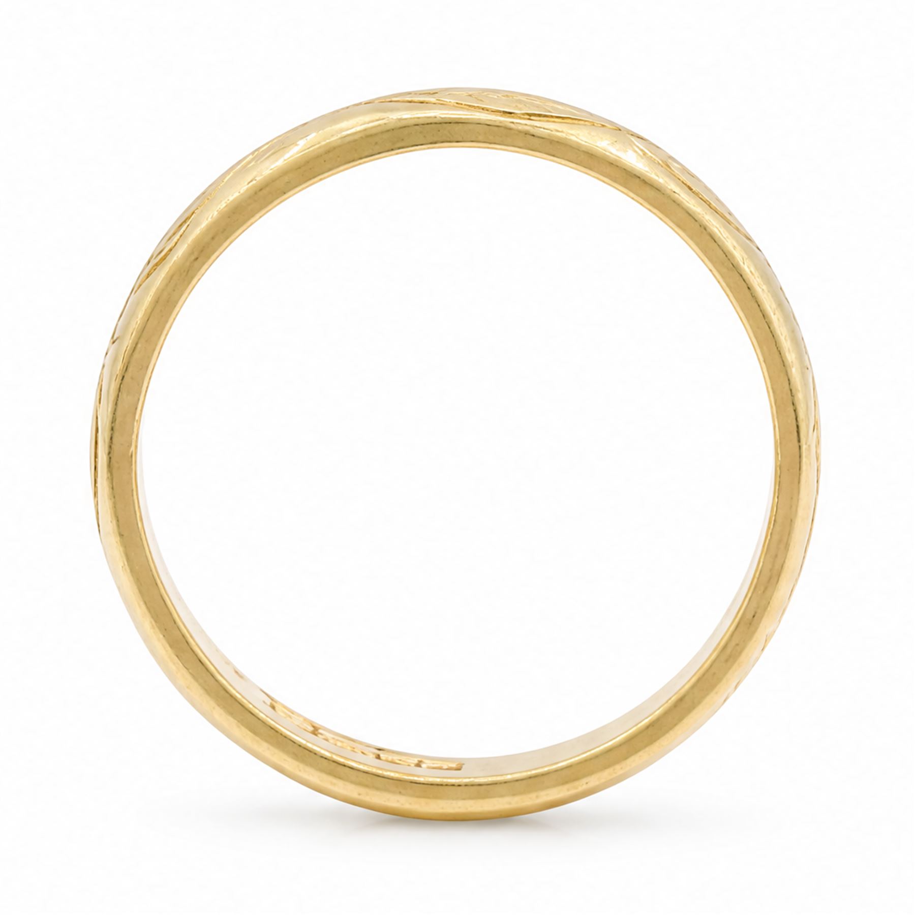 18ct gold wedding band with leaf engraved decoration 
